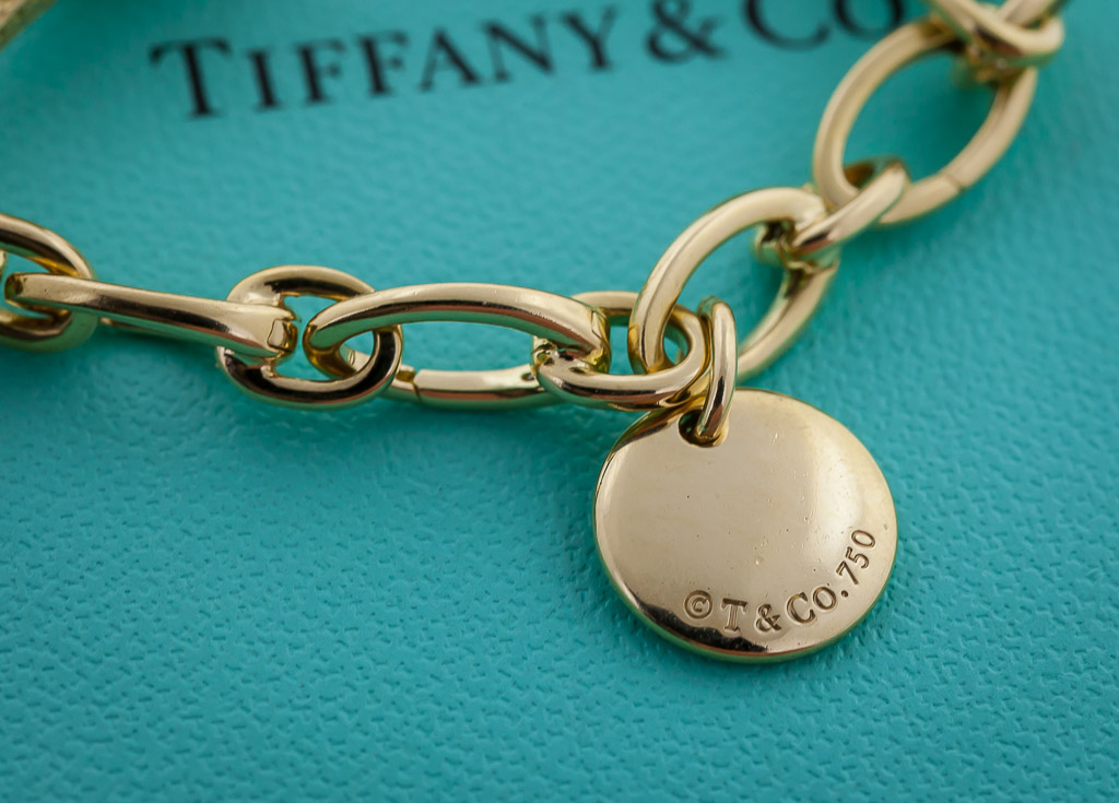 Tiffany & Co. 18 Karat Gold Dog Chain Link Bracelet & Heart Charm